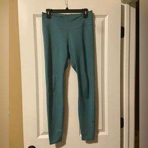 Nike women’s dri-fit leggings. Size large. Dark teal color.